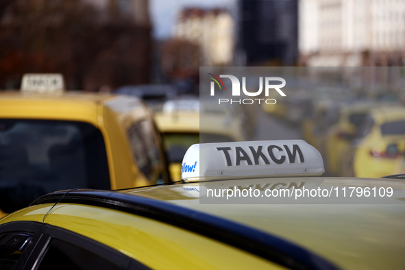 Bulgarian taxi drivers block Tsar Osvoboditel Boulevard with their cars to protest against plans for higher transport insurance tariffs in S...