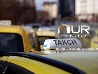 Bulgarian taxi drivers block Tsar Osvoboditel Boulevard with their cars to protest against plans for higher transport insurance tariffs in S...