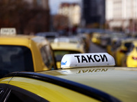 Bulgarian taxi drivers block Tsar Osvoboditel Boulevard with their cars to protest against plans for higher transport insurance tariffs in S...