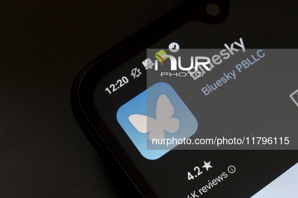 The logo of the social network Bluesky appears on the screen of a smartphone in Reno, United States, on November 20, 2024. 