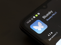 The logo of the social network Bluesky appears on the screen of a smartphone in Reno, United States, on November 20, 2024. (