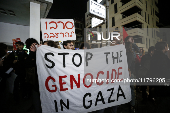 People demonstrate outside the U.S. Consulate in Tel Aviv, Israel, on November 20, 2024, ahead of a vote by the U.S. Senate on legislation t...