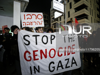 People demonstrate outside the U.S. Consulate in Tel Aviv, Israel, on November 20, 2024, ahead of a vote by the U.S. Senate on legislation t...