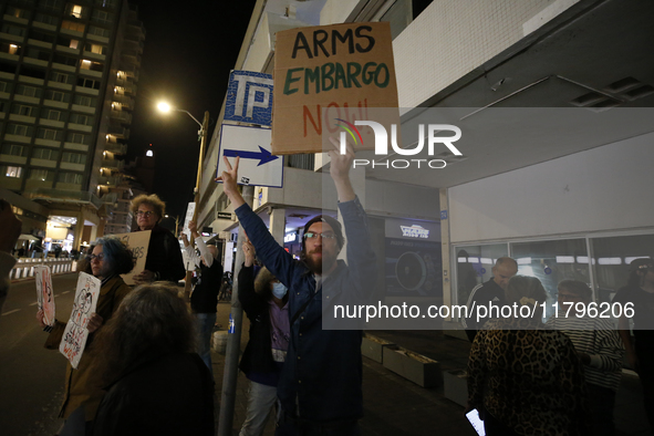 People demonstrate outside the U.S. Consulate in Tel Aviv, Israel, on November 20, 2024, ahead of a vote by the U.S. Senate on legislation t...