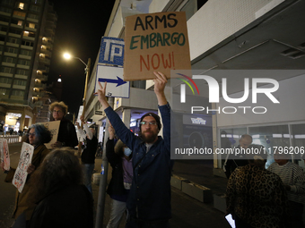 People demonstrate outside the U.S. Consulate in Tel Aviv, Israel, on November 20, 2024, ahead of a vote by the U.S. Senate on legislation t...