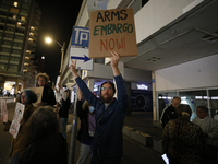 People demonstrate outside the U.S. Consulate in Tel Aviv, Israel, on November 20, 2024, ahead of a vote by the U.S. Senate on legislation t...