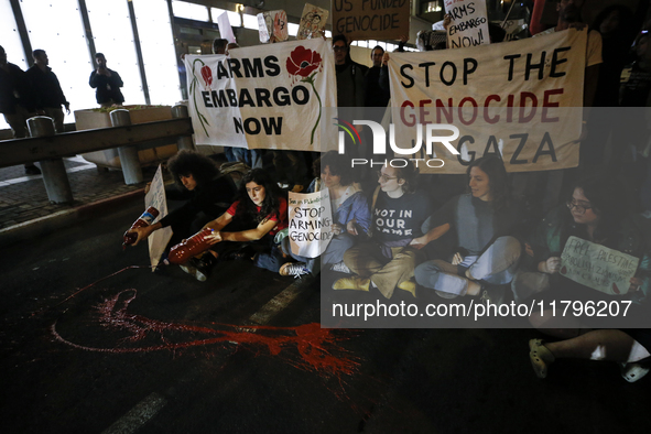 People demonstrate outside the U.S. Consulate in Tel Aviv, Israel, on November 20, 2024, ahead of a vote by the U.S. Senate on legislation t...