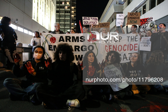 People demonstrate outside the U.S. Consulate in Tel Aviv, Israel, on November 20, 2024, ahead of a vote by the U.S. Senate on legislation t...