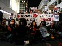 People demonstrate outside the U.S. Consulate in Tel Aviv, Israel, on November 20, 2024, ahead of a vote by the U.S. Senate on legislation t...