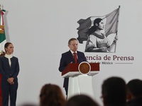 Mexico's President Claudia Sheinbaum Pardo is seen in the background while Arturo Zaldivar Lelo de Larrea, Coordinator of Policy and Governm...