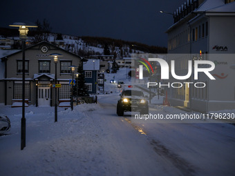 A car moves along one of the main streets in Husavik, Iceland, on November 19, 2024. (