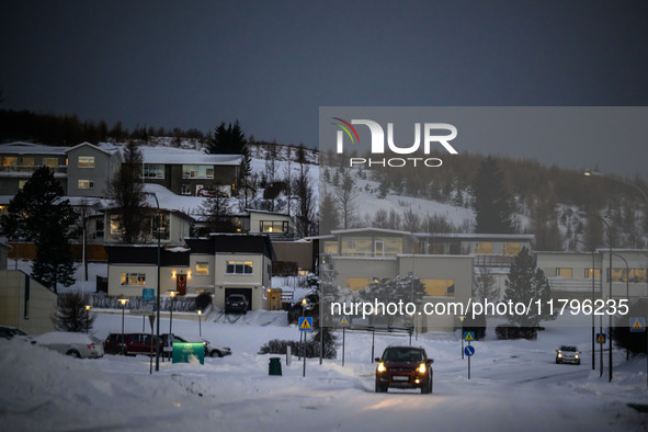 A car moves along one of the main streets in Husavik, Iceland, on November 19, 2024. 