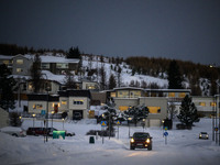 A car moves along one of the main streets in Husavik, Iceland, on November 19, 2024. (