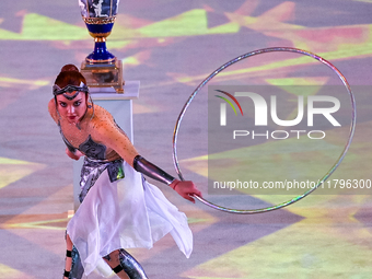 An artist performs at the opening ceremony of the International Rhythmic Gymnastics Tournament ''Sky Grace 2024'' at Aspire Zone Foundation...