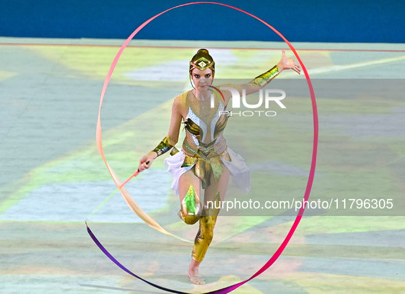 An artist performs at the opening ceremony of the International Rhythmic Gymnastics Tournament ''Sky Grace 2024'' at Aspire Zone Foundation...