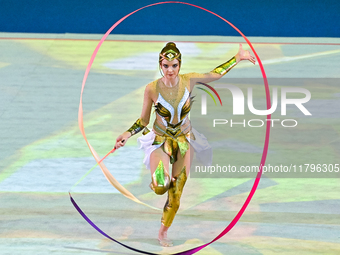 An artist performs at the opening ceremony of the International Rhythmic Gymnastics Tournament ''Sky Grace 2024'' at Aspire Zone Foundation...