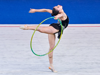 Manuela Gallego of Colombia performs the Hoop exercise during the International Rhythmic Gymnastics Tournament ''Sky Grace 2024'' at Aspire...