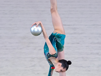 Kondrashina Anna of Belarus performs the Ball exercise during the International Rhythmic Gymnastics Tournament ''Sky Grace 2024'' at Aspire...