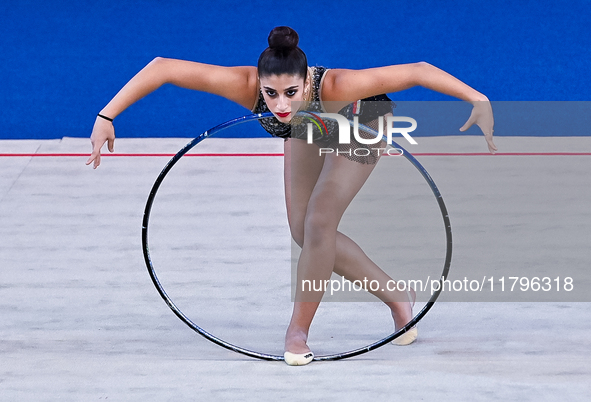 Habiba Aly of Egypt performs the Hoop exercise during the International Rhythmic Gymnastics Tournament ''Sky Grace 2024'' at Aspire Zone Fou...