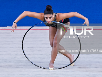 Habiba Aly of Egypt performs the Hoop exercise during the International Rhythmic Gymnastics Tournament ''Sky Grace 2024'' at Aspire Zone Fou...