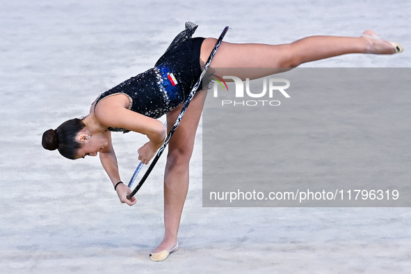 Habiba Aly of Egypt performs the Hoop exercise during the International Rhythmic Gymnastics Tournament ''Sky Grace 2024'' at Aspire Zone Fou...