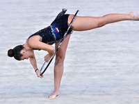 Habiba Aly of Egypt performs the Hoop exercise during the International Rhythmic Gymnastics Tournament ''Sky Grace 2024'' at Aspire Zone Fou...