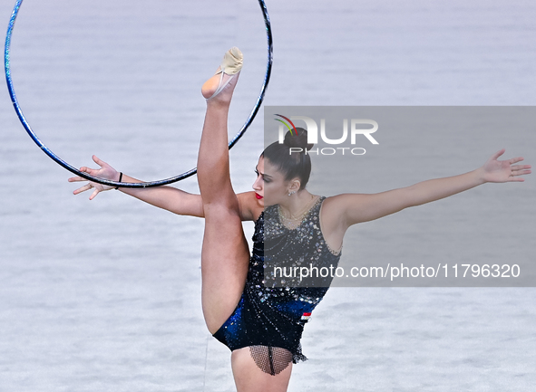 Habiba Aly of Egypt performs the Hoop exercise during the International Rhythmic Gymnastics Tournament ''Sky Grace 2024'' at Aspire Zone Fou...