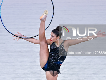 Habiba Aly of Egypt performs the Hoop exercise during the International Rhythmic Gymnastics Tournament ''Sky Grace 2024'' at Aspire Zone Fou...