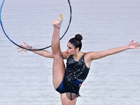 Habiba Aly of Egypt performs the Hoop exercise during the International Rhythmic Gymnastics Tournament ''Sky Grace 2024'' at Aspire Zone Fou...