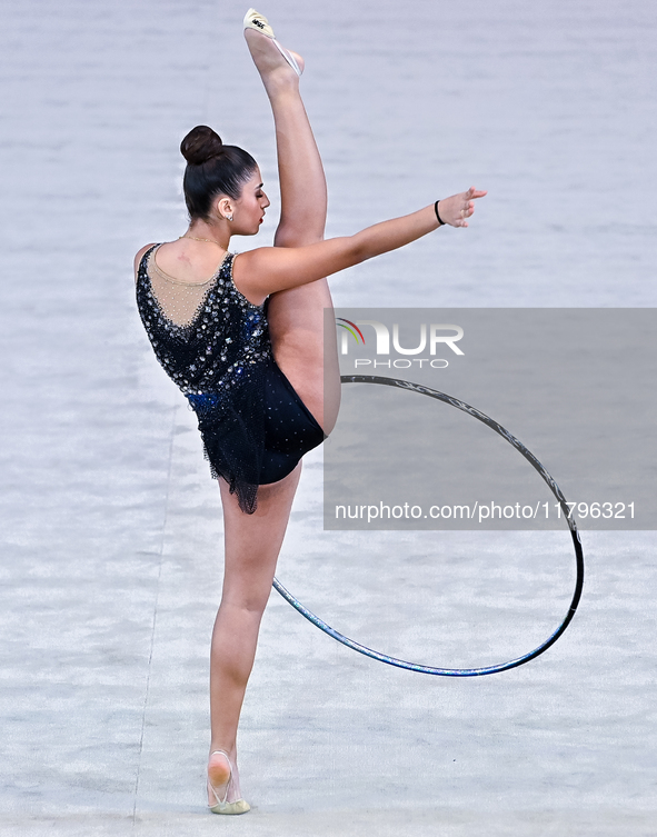 Habiba Aly of Egypt performs the Hoop exercise during the International Rhythmic Gymnastics Tournament ''Sky Grace 2024'' at Aspire Zone Fou...