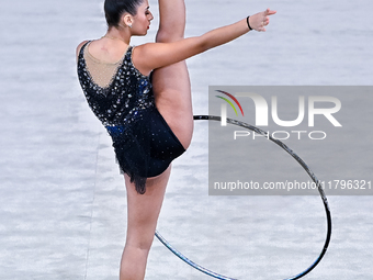 Habiba Aly of Egypt performs the Hoop exercise during the International Rhythmic Gymnastics Tournament ''Sky Grace 2024'' at Aspire Zone Fou...