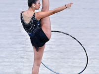 Habiba Aly of Egypt performs the Hoop exercise during the International Rhythmic Gymnastics Tournament ''Sky Grace 2024'' at Aspire Zone Fou...