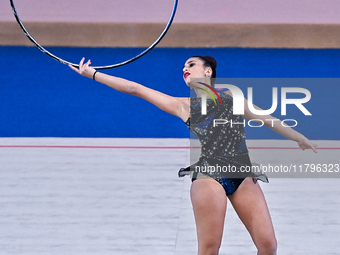 Habiba Aly of Egypt performs the Hoop exercise during the International Rhythmic Gymnastics Tournament ''Sky Grace 2024'' at Aspire Zone Fou...