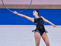 Habiba Aly of Egypt performs the Hoop exercise during the International Rhythmic Gymnastics Tournament ''Sky Grace 2024'' at Aspire Zone Fou...