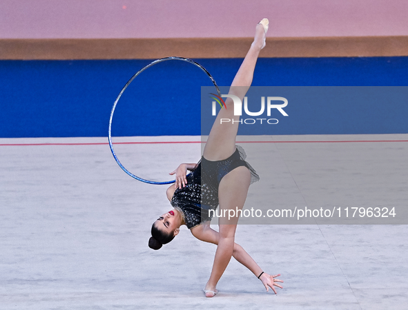 Habiba Aly of Egypt performs the Hoop exercise during the International Rhythmic Gymnastics Tournament ''Sky Grace 2024'' at Aspire Zone Fou...