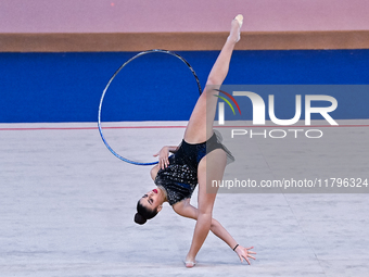 Habiba Aly of Egypt performs the Hoop exercise during the International Rhythmic Gymnastics Tournament ''Sky Grace 2024'' at Aspire Zone Fou...