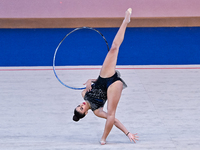 Habiba Aly of Egypt performs the Hoop exercise during the International Rhythmic Gymnastics Tournament ''Sky Grace 2024'' at Aspire Zone Fou...