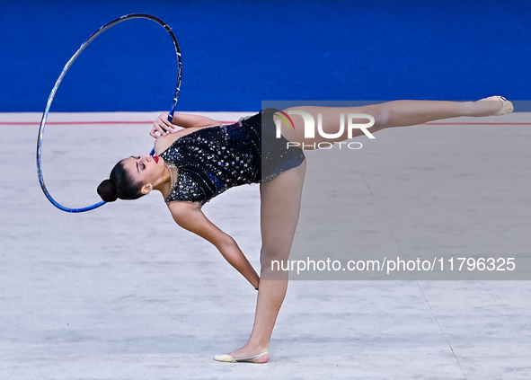 Habiba Aly of Egypt performs the Hoop exercise during the International Rhythmic Gymnastics Tournament ''Sky Grace 2024'' at Aspire Zone Fou...