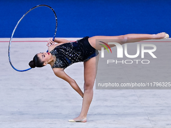 Habiba Aly of Egypt performs the Hoop exercise during the International Rhythmic Gymnastics Tournament ''Sky Grace 2024'' at Aspire Zone Fou...