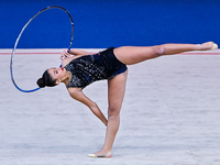 Habiba Aly of Egypt performs the Hoop exercise during the International Rhythmic Gymnastics Tournament ''Sky Grace 2024'' at Aspire Zone Fou...