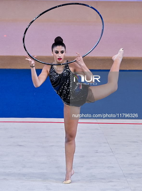 Habiba Aly of Egypt performs the Hoop exercise during the International Rhythmic Gymnastics Tournament ''Sky Grace 2024'' at Aspire Zone Fou...