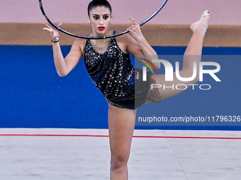 Habiba Aly of Egypt performs the Hoop exercise during the International Rhythmic Gymnastics Tournament ''Sky Grace 2024'' at Aspire Zone Fou...