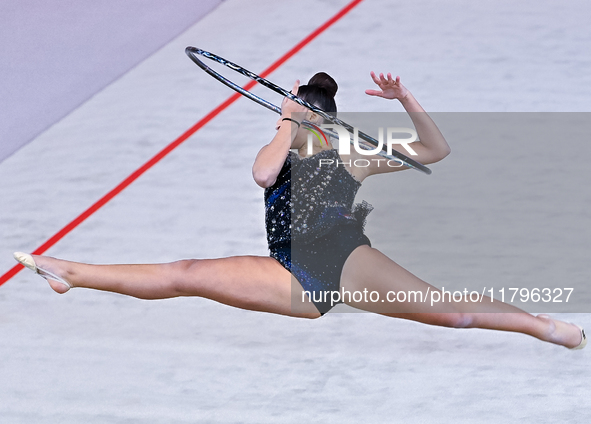 Habiba Aly of Egypt performs the Hoop exercise during the International Rhythmic Gymnastics Tournament ''Sky Grace 2024'' at Aspire Zone Fou...