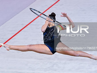 Habiba Aly of Egypt performs the Hoop exercise during the International Rhythmic Gymnastics Tournament ''Sky Grace 2024'' at Aspire Zone Fou...