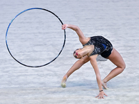 Habiba Aly of Egypt performs the Hoop exercise during the International Rhythmic Gymnastics Tournament ''Sky Grace 2024'' at Aspire Zone Fou...