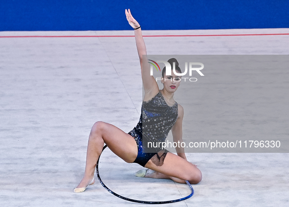 Habiba Aly of Egypt performs the Hoop exercise during the International Rhythmic Gymnastics Tournament ''Sky Grace 2024'' at Aspire Zone Fou...