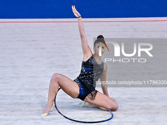 Habiba Aly of Egypt performs the Hoop exercise during the International Rhythmic Gymnastics Tournament ''Sky Grace 2024'' at Aspire Zone Fou...