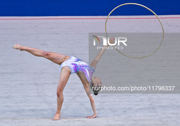 Alexandra Kirpichnikova of Germany performs the Hoop exercise during the International Rhythmic Gymnastics Tournament ''Sky Grace 2024'' at...