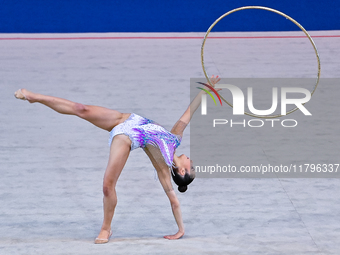 Alexandra Kirpichnikova of Germany performs the Hoop exercise during the International Rhythmic Gymnastics Tournament ''Sky Grace 2024'' at...