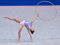 Alexandra Kirpichnikova of Germany performs the Hoop exercise during the International Rhythmic Gymnastics Tournament ''Sky Grace 2024'' at...